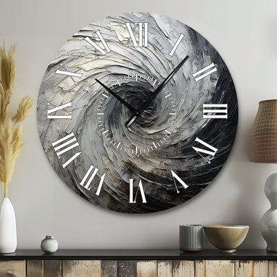 Horloge murale grise et noire