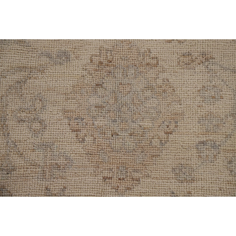Tapis oriental beige / ivoire en laine noué à la main 5 pi 9 po x 8 pi 8 po