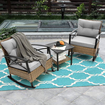 Chaise berçante d'extérieur en gris avec construction et assemblage facile pour la cour