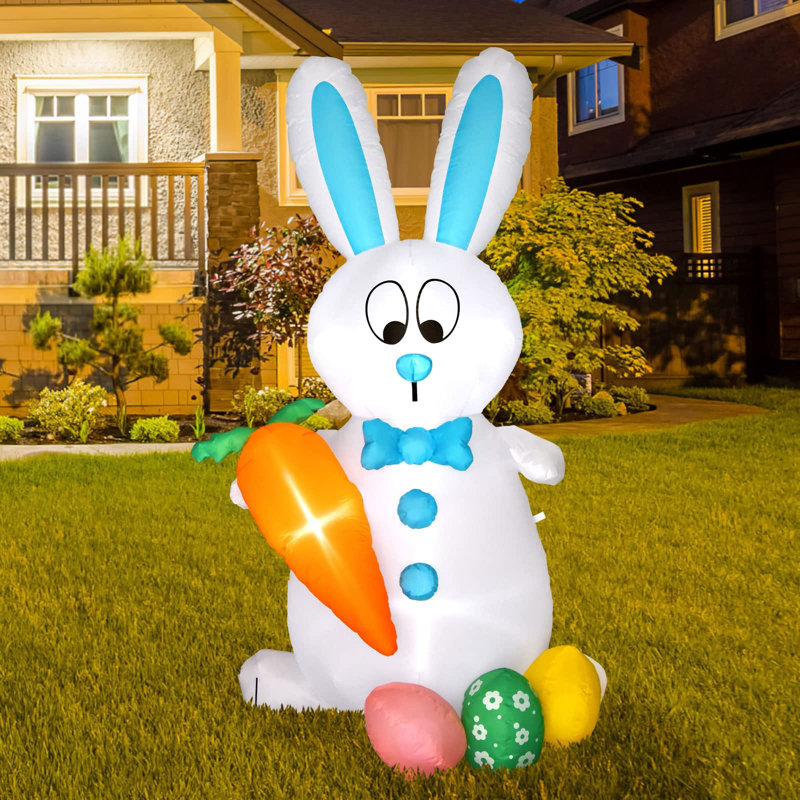 Lapin gonflable avec carotte et œufs de Pâques