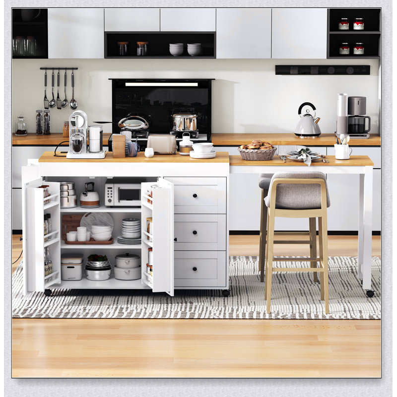 Îlot de cuisine polyvalent avec table de salle à manger extensible, rangement spacieux et prises de courant, parfait pour les cuisines modernes