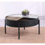 Table basse ronde moderne avec rangement dissimulé et plateau en matériaux mélangés