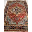 Kerri Oriental Area Rug in Rust