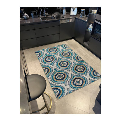 Tapis bleu tissé lavable à la machine