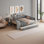 Lit plateforme double tapissier pleine grandeur avec tablettes de rangement, bureau, station de charge et lit gigogne