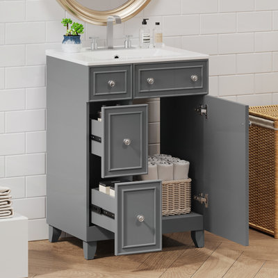 Meuble-lavabo 24 po avec lavabo en céramique, 2 tiroirs et 1 porte à fermeture en douceur pour les petites salles de bain