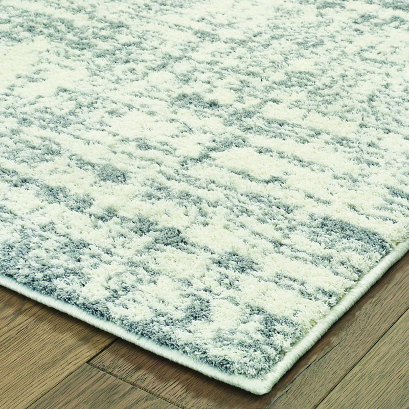 Tapis ivoire / gris tissé à la machine