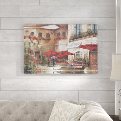 Parasol rouge à l'extérieur du bistro - reproduction sur toile