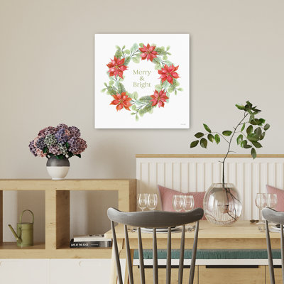 Couronne de poinsettia joyeuse et lumineuse
