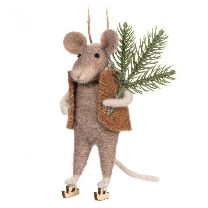 Patin de souris tenant un ornement d'arbre