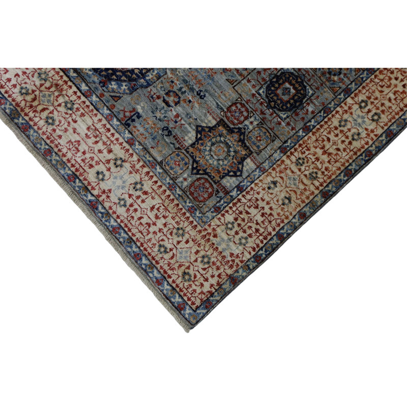 Hand Knotted Wool Area Rug in Silver And Beige