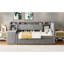 Lit de jour simple rembourré gris avec tiroirs, étagères, armoires rabattables et table d'appoint - une solution pratique pour les petits espaces de vie bien décorés en velours doux, tablettes, appartements peu encombrants-121077016
