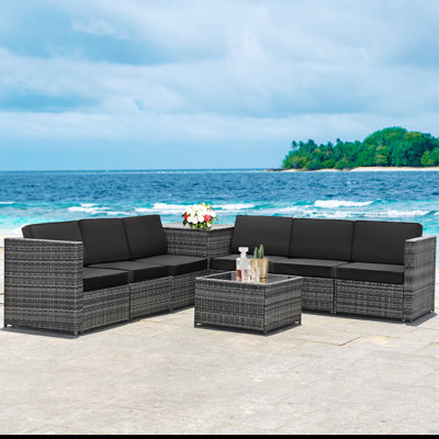 Burand 8 Piece Rattan Sectional Seating Group with Cushions by Ebern Designs