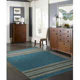 Tapis à motif rayé noué à la main en coton bleu sarcelle Dolley