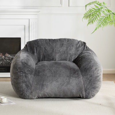 Fauteuil à billes gris en fausse fourrure, mousse déchiquetée pour des sièges de soutien dans différents cas d'utilisation et cruauté