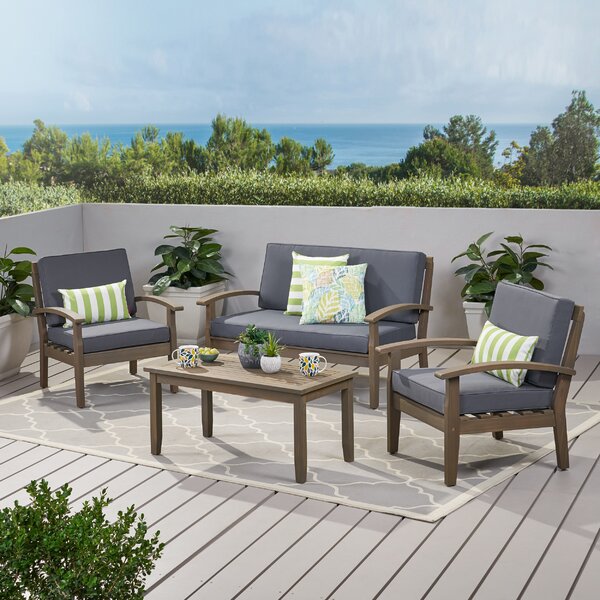 https://assets.wfcdn.com/im/43132842/resize-h600-w600%5Ecompr-r85/1041/104148706/Shynel+4+-+Person+Outdoor+Seating+Group+with+Cushions.jpg