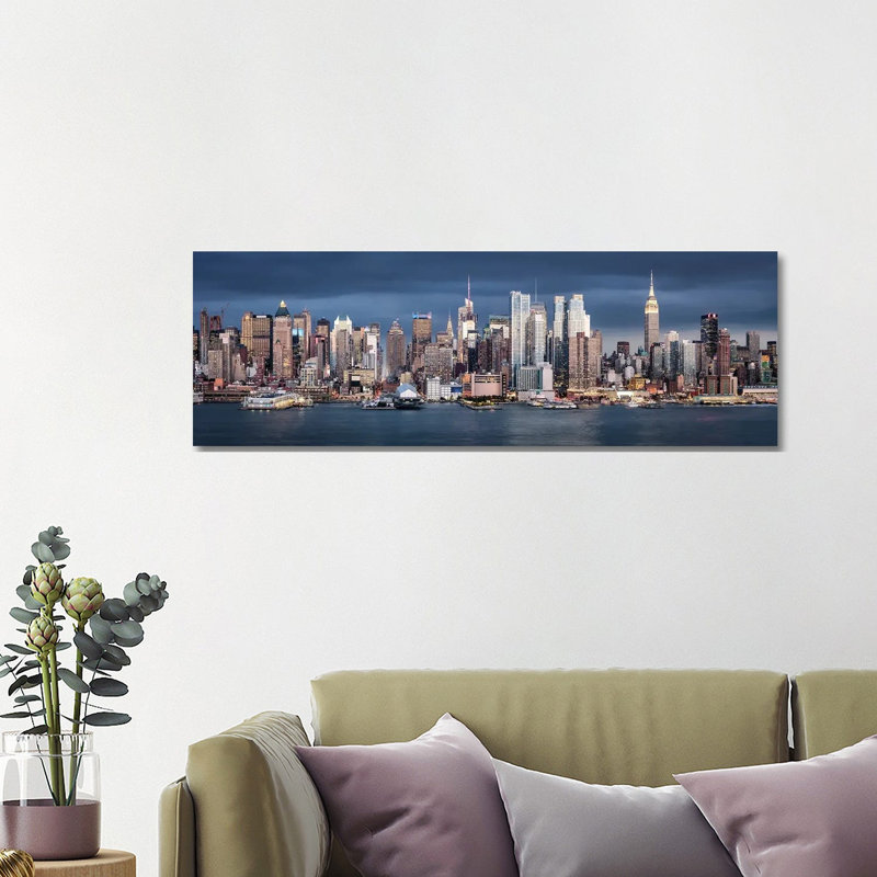Panoramic View Of The Manhattan Skyline Along The Hudson River by Jan Becke - Wrapped Canvas Panoramic Print