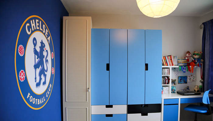 boy's bedroom decorated in Chelsea football club theme
