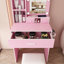 Coiffeuse avec support pour sèche-cheveux. Tabouret, miroir, prise électrique et éclairage DEL réglable.
