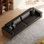 Canapé extra profond en similicuir noir à 4 places, accoudoirs carrés de 270 cm (106,3 po) avec garniture en bois massif et 2 coussins.