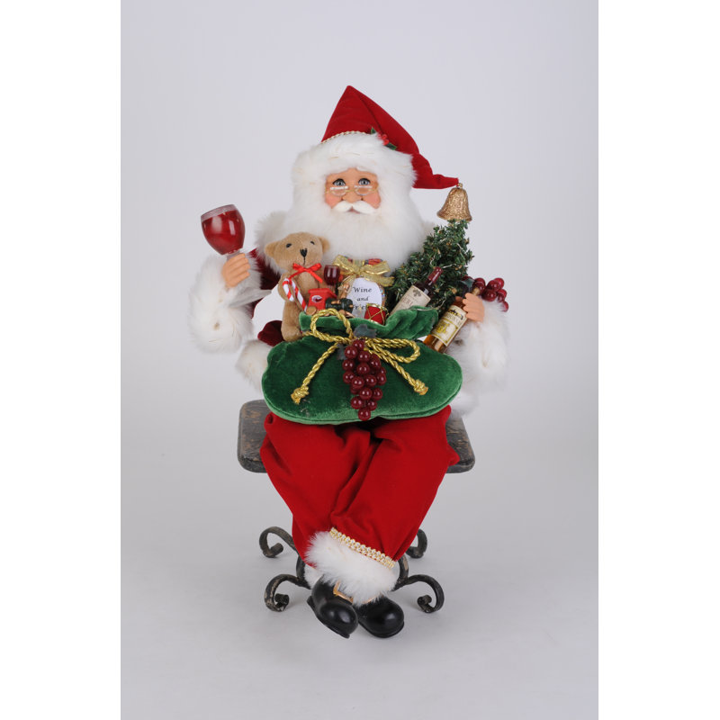 Cadeau de Noël illuminé, père Noël assis