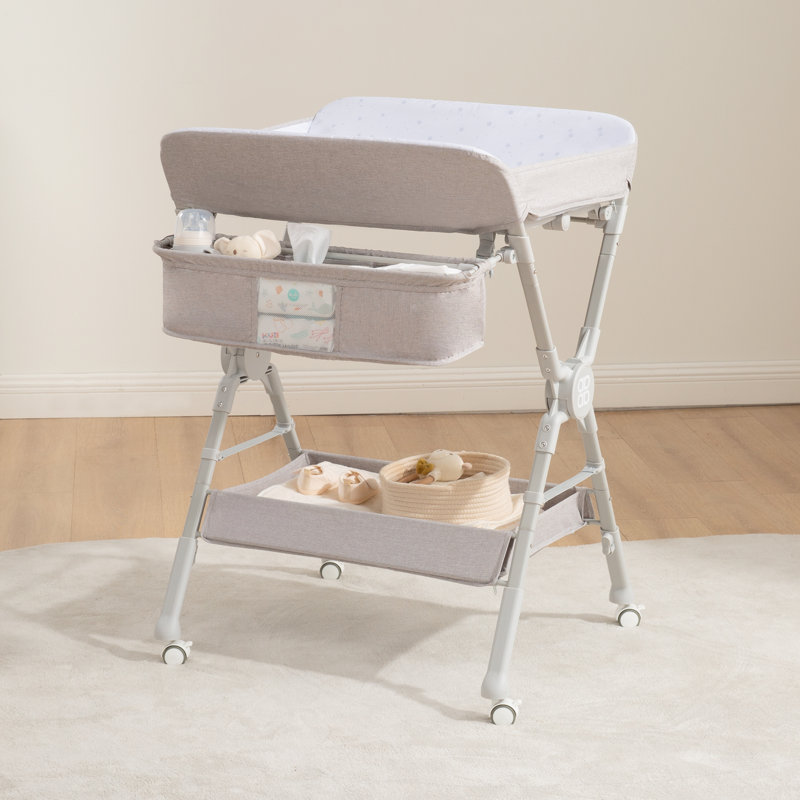 Table à langer portable pliante avec roulettes et surface imperméable, Gris