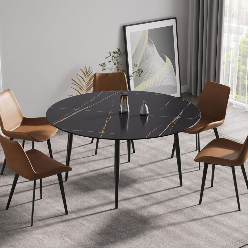 Table de salle à manger moderne en pierre artificielle ronde avec pieds en métal noir - peut accueillir 6 personnes. (Seulement tables, pas de chaises)