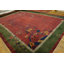 Grand tapis corail / saumon rose antique noué à la main des années 1920
