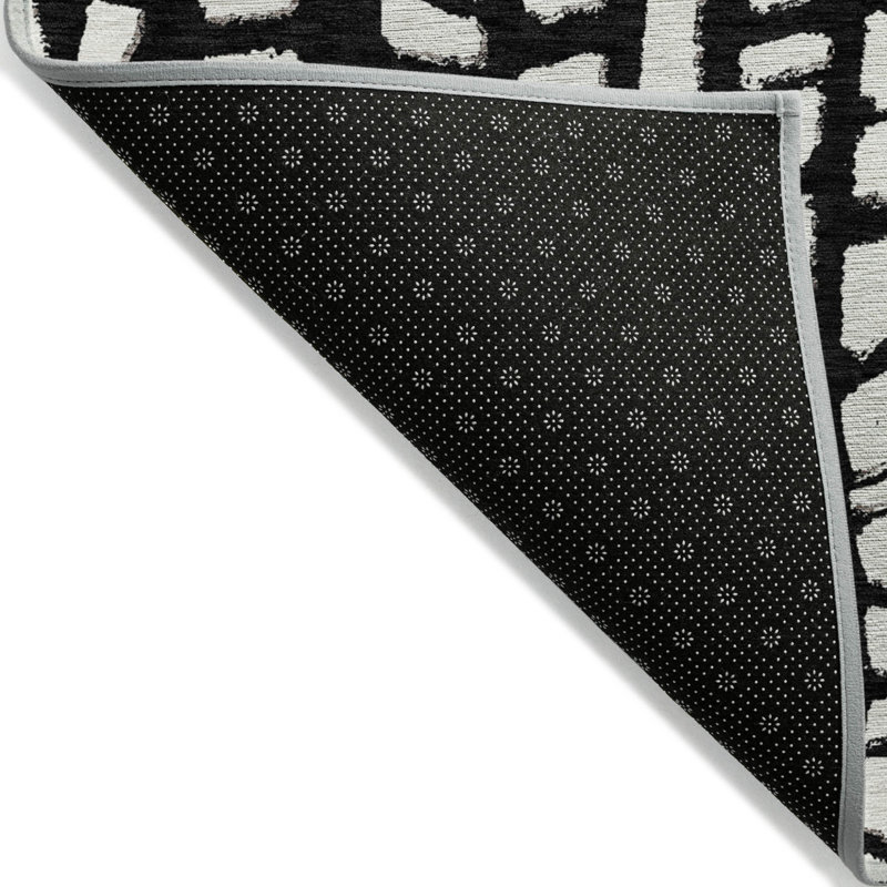 Tapis rond noir et ivoire 8 po