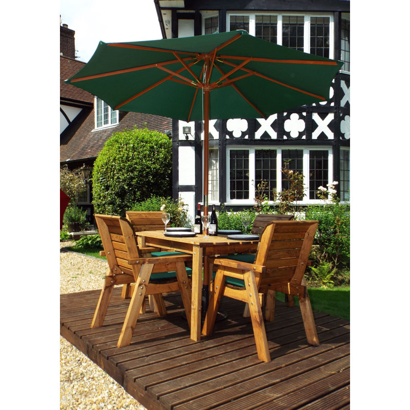 Feldman 4 - Person Wood Patio Dining Set with Rectangular Table , Cushions Included, Green