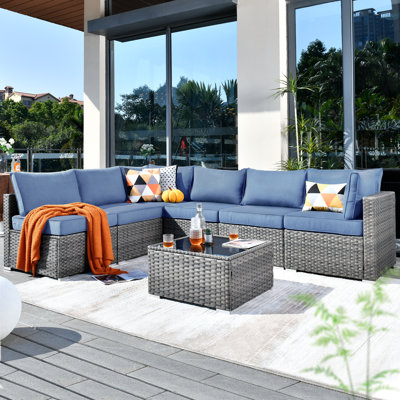 Lava 7 Piece Rattan Sectional Seating Group With Cushions