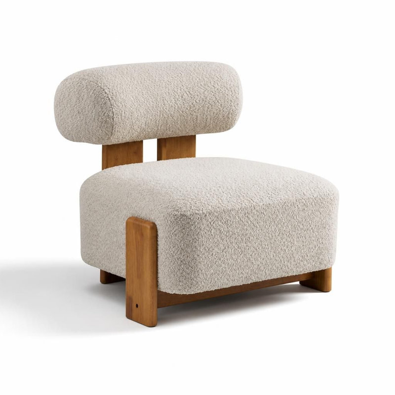 Fauteuil lounge moderne en boucle, avec structure en bois massif et dossier arrondi. Revêtement en boucle souple et résistant, assise large et design ergonomique.
