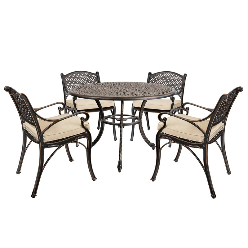 Decklan 5 - Person Patio Dining Set with Round Table , Cushions Included