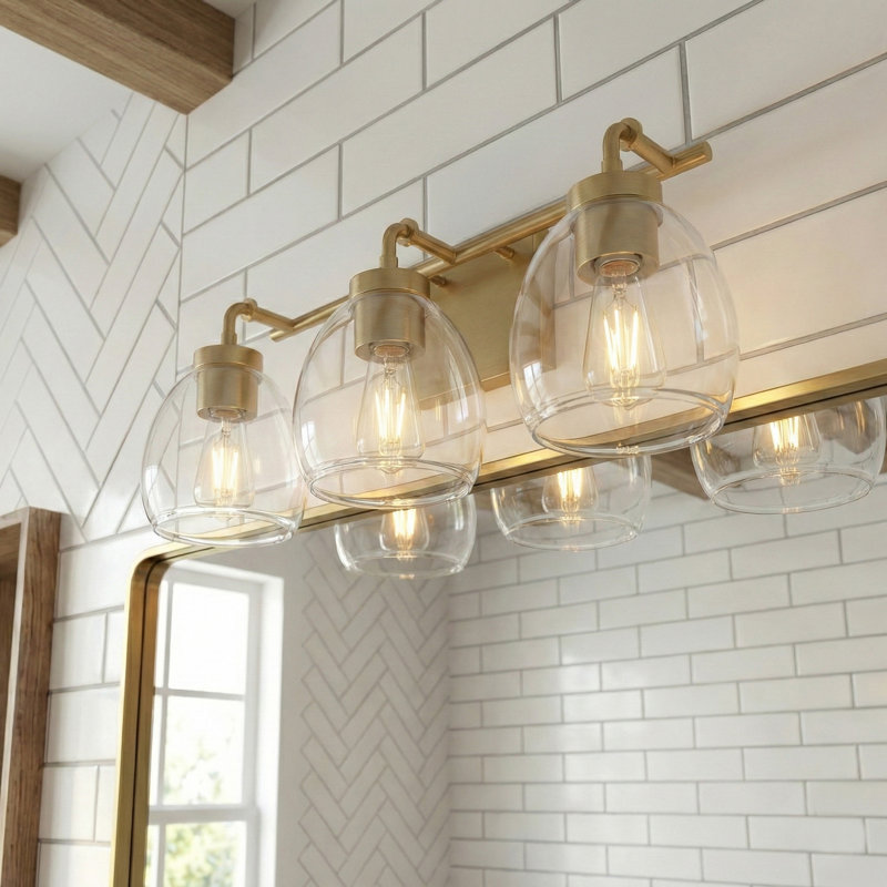 Meuble-lavabo 3 lumières 24 po avec globes en verre transparent Brandon, Laiton