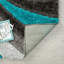 Tapis turquoise à motif géométrique Koo-1394437170
