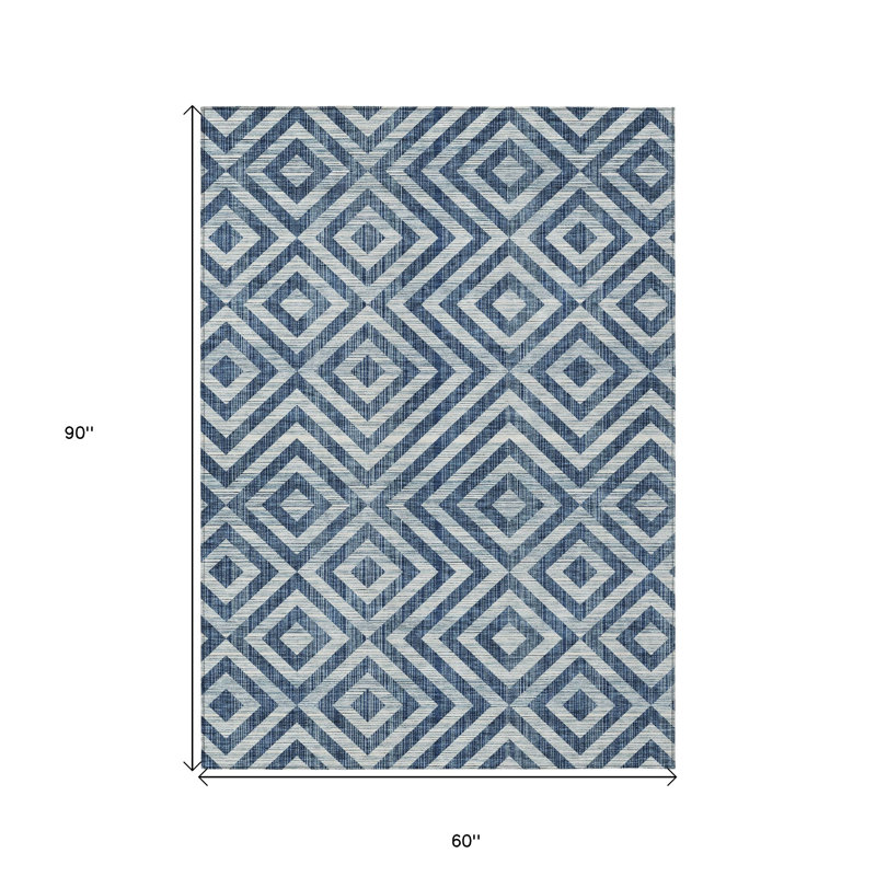 Tapis extérieur lavable géométrique bleu marine et ivoire 5 pi x 8 pi