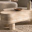 Table basse irrégulière avec plateau rabattable et compartiment de rangement caché
