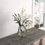 Orchids Arrangement in Vase-677849085