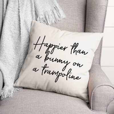 Coussin décoratif noir et blanc "Happier Than a Bunny"