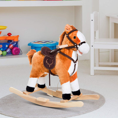 Cheval à bascule en peluche pour enfants avec son réaliste et queue qui bouge