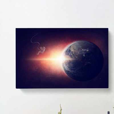 Astronaut & Planet Earth - Wrapped Canvas Print