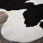 Tapis contemporain en peau de vache noir 17-1805204879