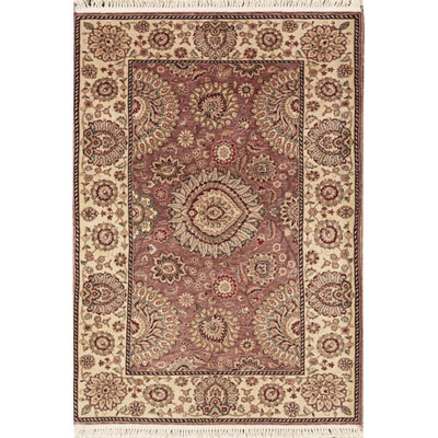 Tapis rose et ivoire de haute qualité noué à la main