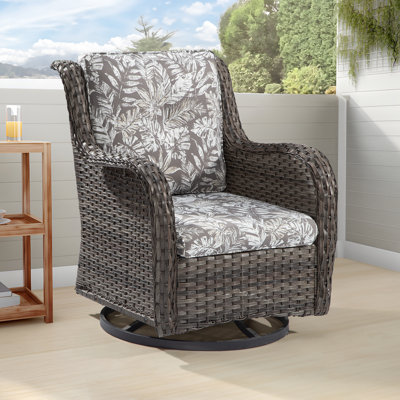 Chaise berçante d'extérieur en polyéthylène (PE) avec coussins Ashlamari