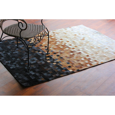 Mckinney Geometric Cowhide Area Rug