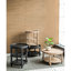 Table ronde avec tablettes - bois noir pour un charme rustique et deux rangements ouverts