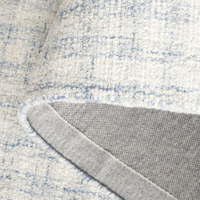Antine Ebony Hand Tufted Wool/Cotton Checkered Rug in Blue/Ivory