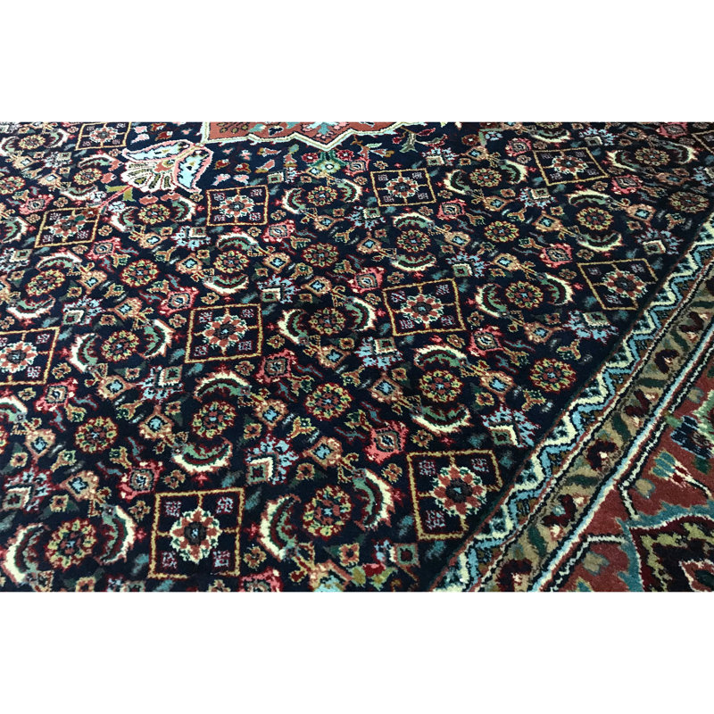 Tapis bleu de haute qualité noué à la main