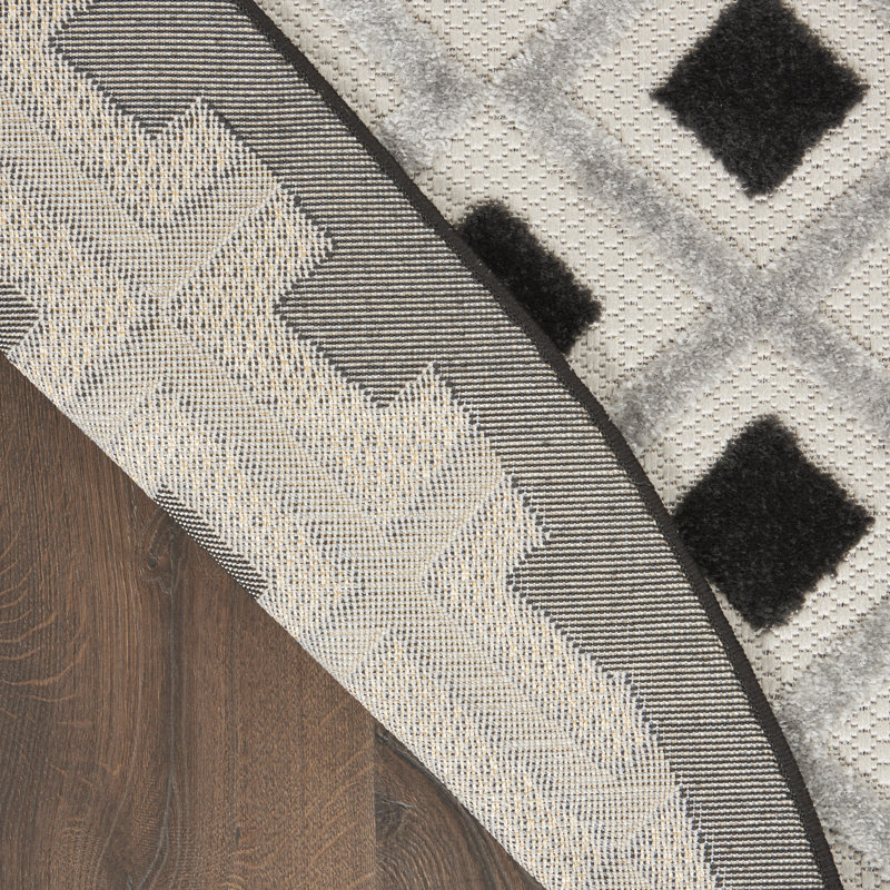 Tapis noir Newton Houndstooth, Rond 7 pi 10 po