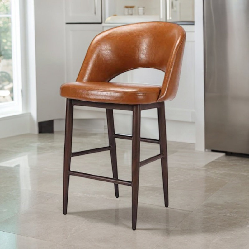Tabouret Xaedyn classique en cuir de style Mid-Century moderne, bien que fabriqué, Tanné
